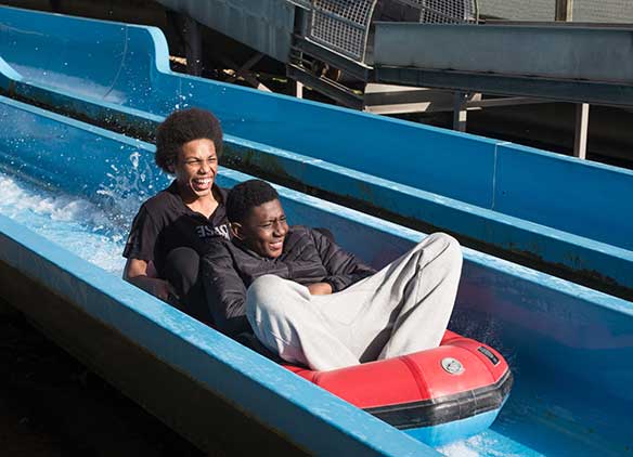 Picture of older students having a splashing time on their New Forest school trip